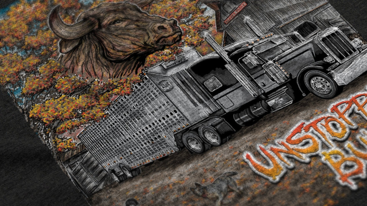 Close-up of Unstoppabull ranch artwork printed on black shirt fabric