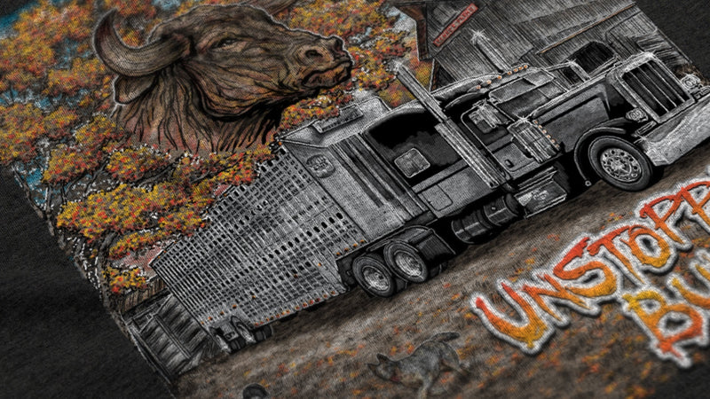 Close-up of Unstoppabull ranch artwork printed on black shirt fabric